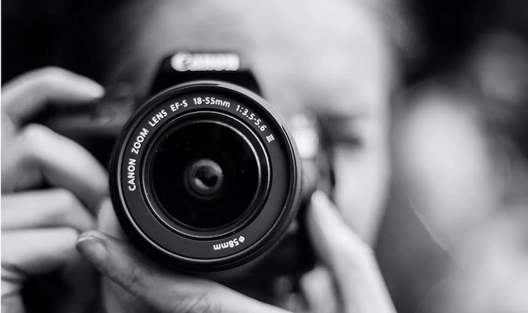 Photographer capturing images to be used in business blog content