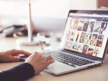 Person preparing to use images in blog posts on their business laptop